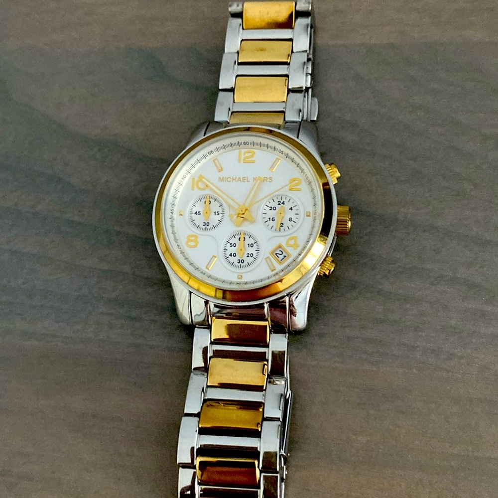 Ladies Michael Kors two-tone watch.